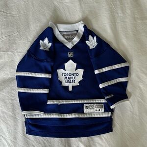Super cute licensed Toronto Maple Leaf jersey.  2-4T